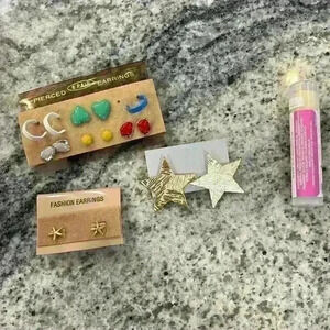 Vintage bundle of 7 pairs of costume jewelry with hoops heart, stars, & starfish